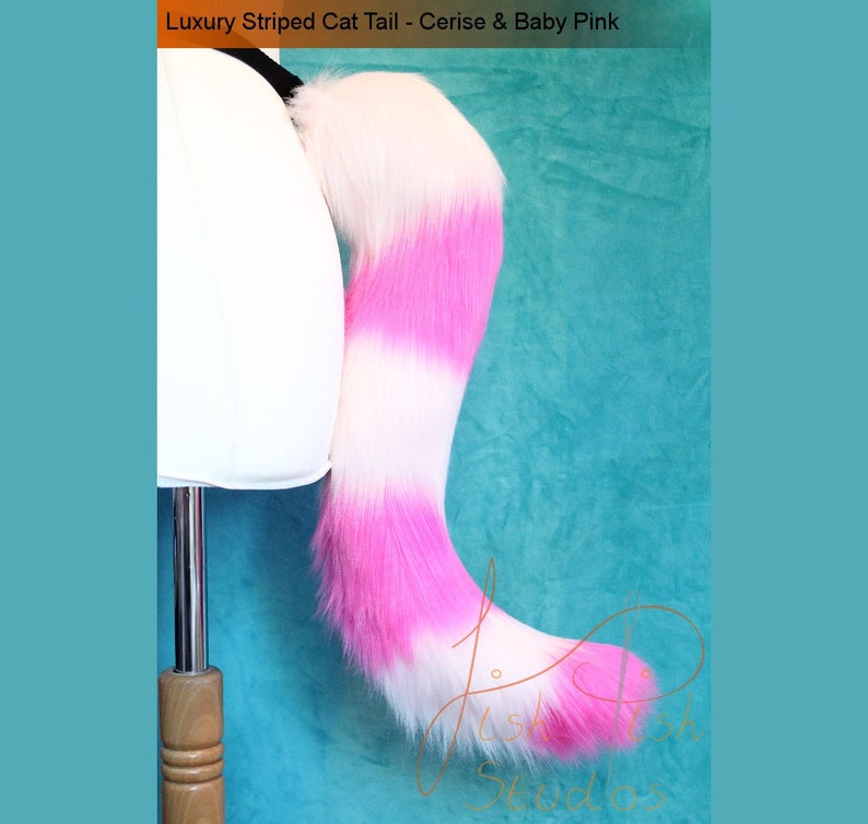 a six stripe/banded cat tail in pink and hot pink. great for cheshire cat cosplays and fursuits