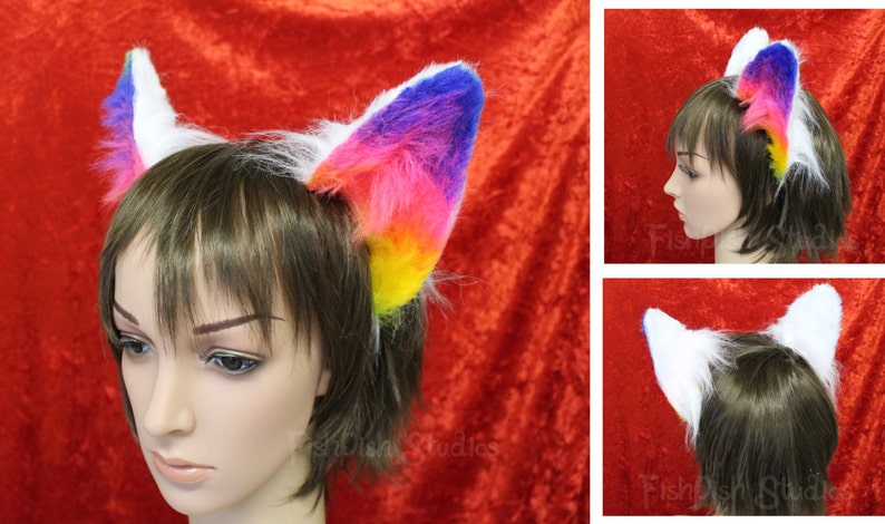 an all round example of our rainbow and white flexi cat ears. showing the side, back and front

these ears are fixed to a metal headband and have wire along the edge for bending into shape