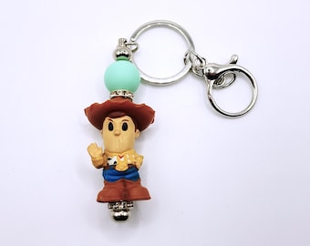Llavero de Woody Ooshie / Llavero de juguete reciclado / Llavero inspirado en Toy Story / Colgante para bolso reciclado / Regalo coleccionable original
