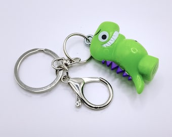 Llavero de dinosaurio para bolso / Llavero de juguete reutilizado / Accesorio de dinosaurio reciclado / Adorno original para bolso / Regalo de dinosaurio colorido