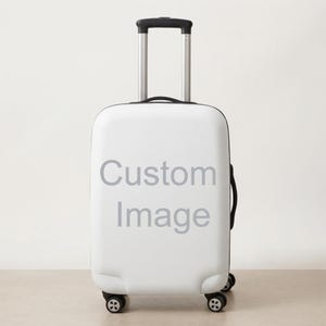 Könnte beinhalten: Ein weißer Hartschalenkoffer mit einem ausziehbaren schwarzen Griff und vier schwarzen Rollen. Auf der Vorderseite des Koffers befindet sich der graue Text Custom Image in der Mitte. Das Gepäckstück hat einen schwarzen Reißverschluss an der Seite.