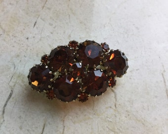 Firey amber stone brooch