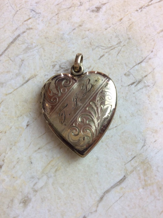 Antique gold heart locket