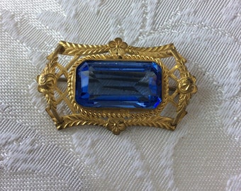 Beautiful blue faceted glass brooch