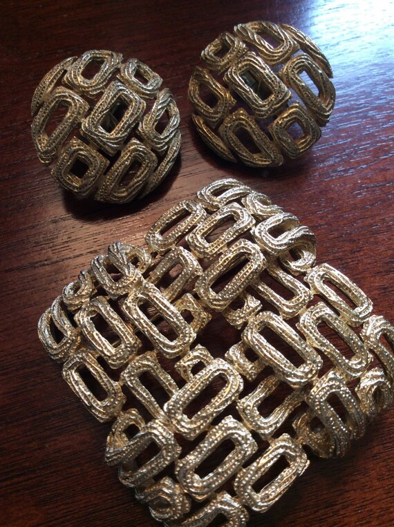 Crown Trifari brooch and earrings