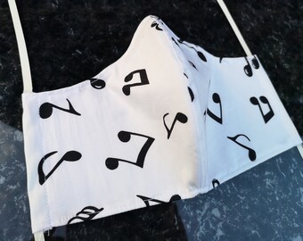 3 ply music note print face mask covering white cotton with nose wire, sewn in filter layer and headband elastic. child and adult sizes