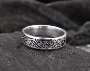 Anello in argento sterling con intricati motivi a volute, fede nuziale floreale ispirata alla natura, unisex.