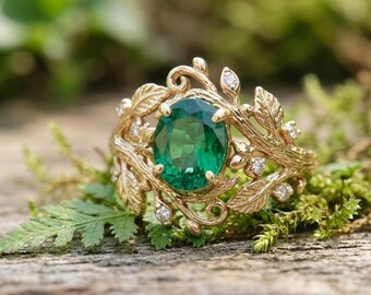 Anello ovale a forma di foglia con smeraldo, fascia con ramo botanico, gioiello naturalistico in oro 14 carati
