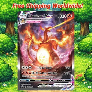 May include: A Charizard VMAX Pokémon card with a fiery orange and yellow illustration. The card features the text "Charizard VMAX" and "Claw Slash." The background shows a green landscape with trees and bushes.