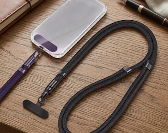 Cordino universale per cellulare da portare a tracolla, con cinturino regolabile e cordino per cellulare rimovibile.