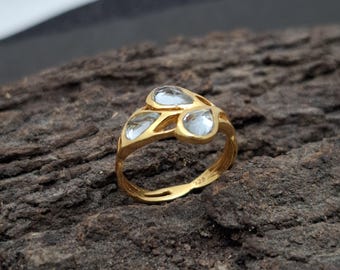 Anillo de oro con topacio azul de Londres, anillo de topacio BT, anillo con gema en forma de lágrima, anillo minimalista, diseño único, anillo con banda anudada, regalo para ella.