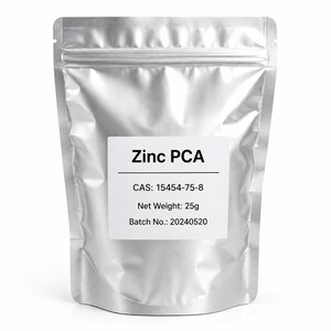 May include: A silver-colored, stand-up resealable pouch containing Zinc PCA. A white label on the front displays the text: Zinc PCA, CAS: 15454-75-8, Net Weight: 25g, and Batch No.: 20240520. The pouch has a matte metallic finish.