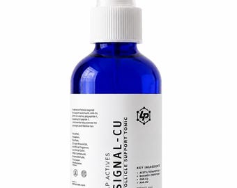 May include: A cobalt blue glass spray bottle with a white pump top and a white label. The label reads LP ACTIVES SIGNAL-CU FOLLICLE SUPPORT TONIC, lists key ingredients like GHK-CU and AHK-CU, and states a volume of 120ml | 4oz.