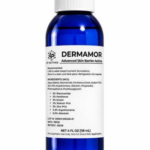 May include: A blue glass bottle with a white screw cap and a white label featuring the text DERMAMOR Advanced Skin Barrier Active. The label lists ingredients including Niacinamide, Panthenol, and Ectoin, with a net volume of 4 FL OZ (118 mL).