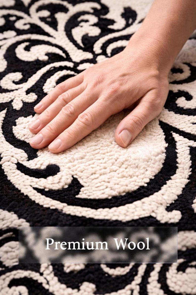 May include: A black and cream rug featuring a high-pile, tufted damask pattern. The surface has a textured, looped construction with a soft appearance. The text "Premium Wool" is overlaid at the bottom of the image in a clear, white font.