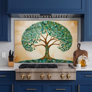 May include: A decorative tree art piece with a brown trunk and branches, and a full crown of green leaves. The artwork is set against a light tan background, creating a nature-inspired theme. The tree's roots are visible at the base.