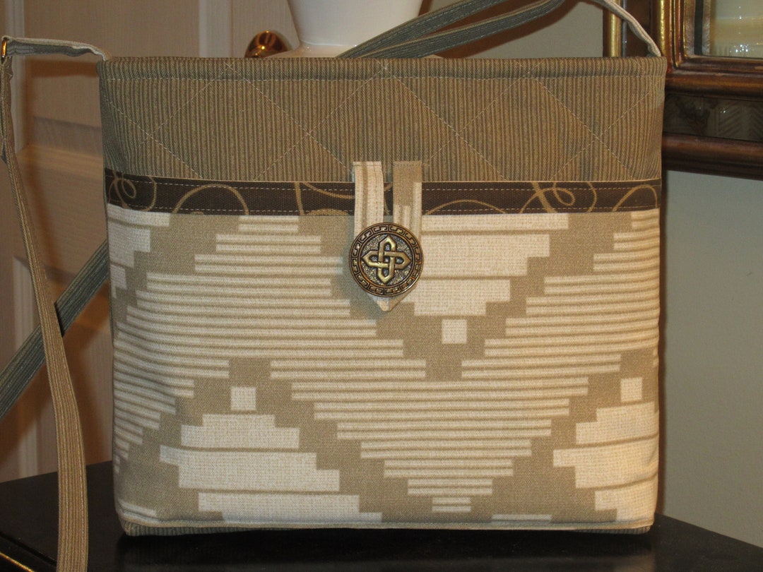 Beige Purse With a Beige and White Diagonal Print Front Pocket With ...