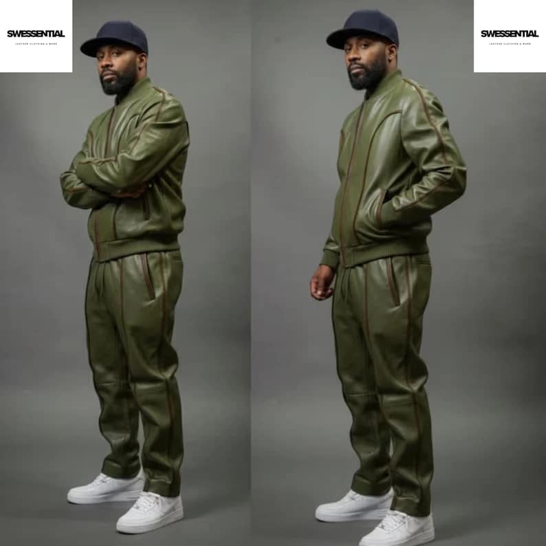 May include: Olive green leather track suit with brown trim. The jacket has a zipper closure and the pants have pockets. The outfit is paired with white sneakers and a navy blue baseball cap. The Swessential logo is in the top right corner.