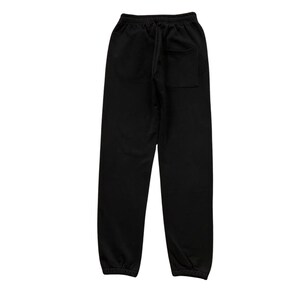 May include: A set of three ceramic mugs with a speckled, matte finish. The mugs are in shades of cream, light gray, and dark gray. Each mug has a simple, minimalist design, perfect for coffee or tea.