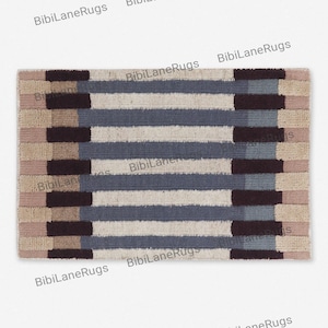May include: Rectangular rug with a striped pattern in beige, blue, and brown. The rug has alternating horizontal stripes of varying widths and textures, creating a textured appearance. Suitable for indoor use, it measures approximately 120 cm x 180 cm.