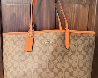 Coach City Tote | Signature Canvas, Reversible Neon Orange Interior