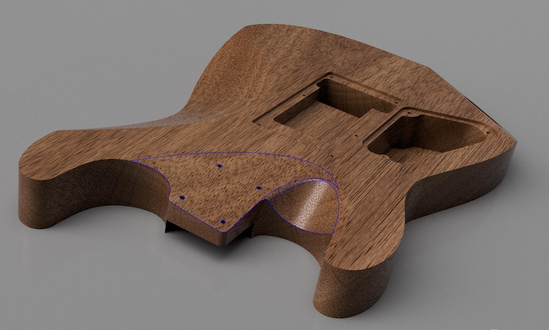 May include: A brown wooden electric guitar body featuring a prominent wood grain pattern, a contoured shape, and multiple recessed cavities for electronic components. The surface includes a defined area outlined in blue with small screw holes.
