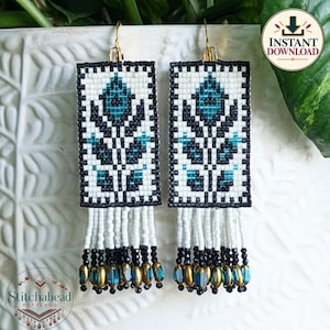 May include: Rectangular beaded earrings featuring a white background with a black and teal geometric floral pattern. The earrings have gold-tone hooks and a fringe bottom made of white beads, black beads, and teal and gold-tone accents.