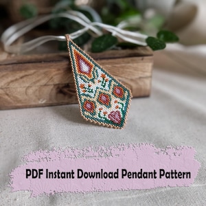May include: A diamond-shaped pendant crafted from small beads in shades of green, orange, white, and pink, suspended from a white ribbon. The text PDF Instant Download Pendant Pattern is displayed in black on a light pink textured background.