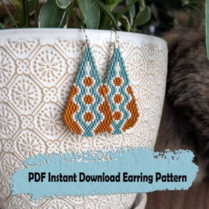 May include: Teardrop-shaped beaded earrings in teal, white, and orange. The earrings have a geometric pattern and silver-coloured hooks. The text "PDF Instant Download Earring Pattern" is displayed on a blue background.