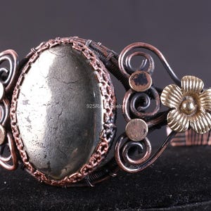 May include: A rustic wooden sign with the text "Welcome to our home" in white lettering. The sign features a distressed finish and a simple, inviting design, perfect for a front porch or entryway.