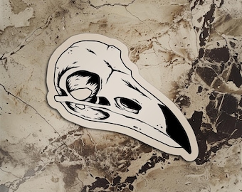 Sticker tête de mort corbeau