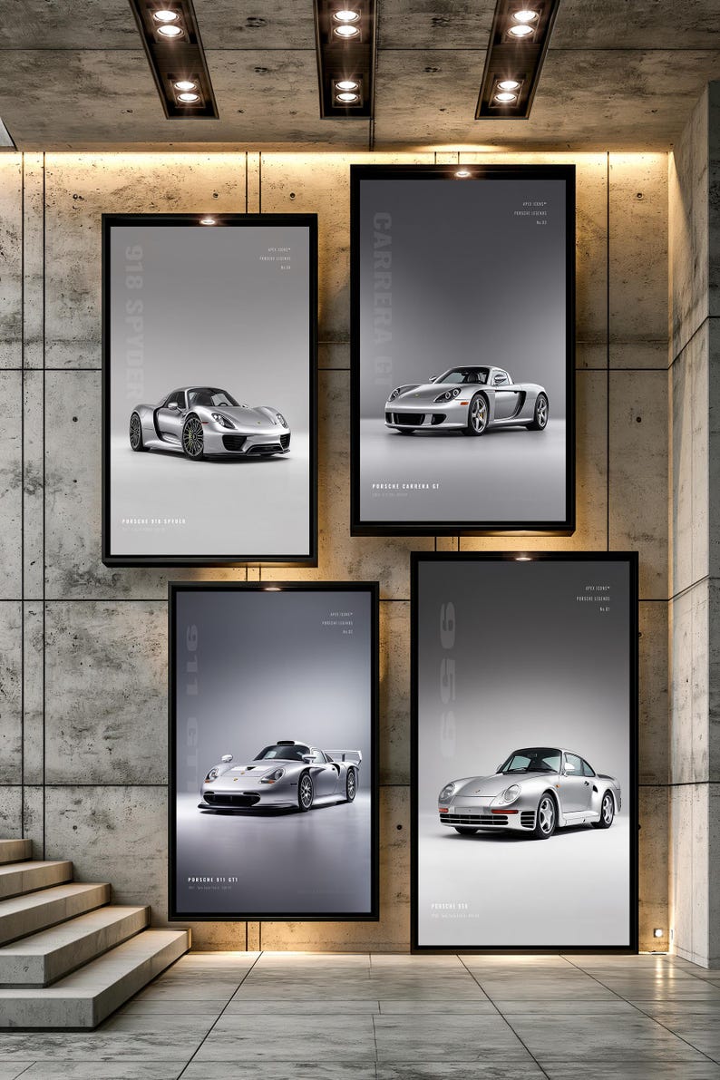 May include: Four rectangular wall posters featuring silver Porsche sports cars. The posters display the 918 Spyder, Carrera GT, 911 GT1, and 959 models, each with model names and technical text printed in white against a grey gradient background.