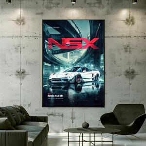 May include: A vertical wall poster featuring a white Honda NSX NA1 sports car parked on a wet city street at night. The text NSX is displayed in large red letters at the top, with Tokyo Division and Honda NSX NA1 printed in white text below.
