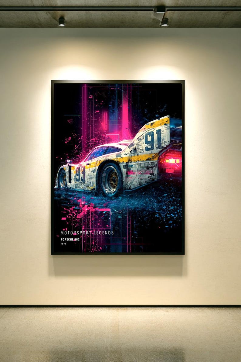 May include: A framed wall art print featuring a white and yellow Porsche 962 race car with the number 91 on the side. The background is black with vibrant pink neon vertical lines and debris. Text at the bottom reads MOTORSPORT LEGENDS PORSCHE 962 1986.
