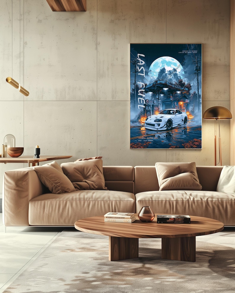 May include: A vertical wall poster titled LAST FUEL featuring a white Toyota Supra sports car parked at a petrol station under a large full moon. The scene includes orange pumpkins, utility poles, and wet pavement reflecting the blue and white light.