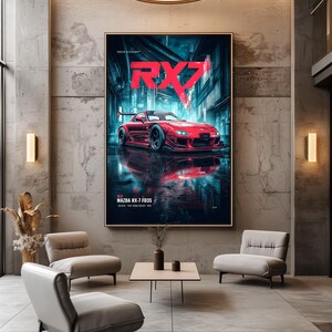 May include: A vertical wall art print featuring a red Mazda RX-7 FD3S sports car parked on a wet street at night. The image displays the text RX7 in large red letters, with Tokyo Division and Mazda RX-7 FD3S printed in white text below the car.