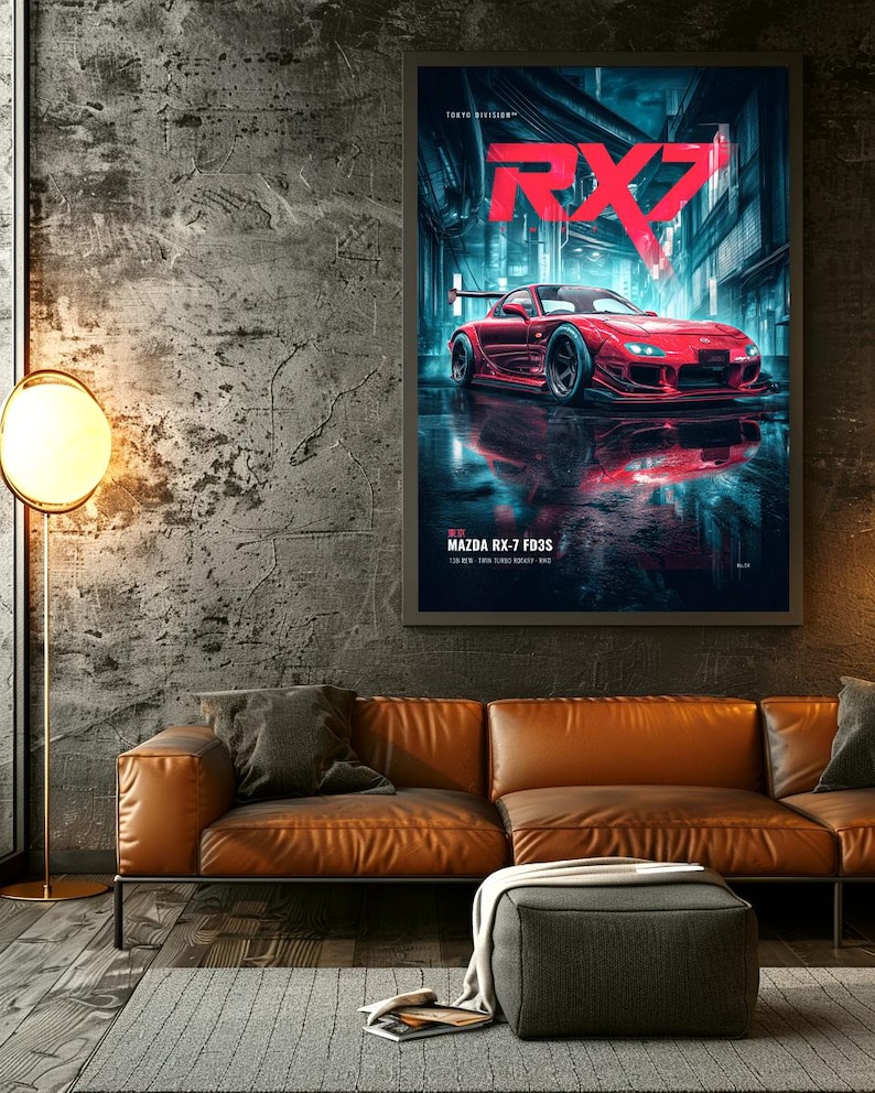 May include: A framed wall poster featuring a red Mazda RX-7 FD3S sports car parked on a wet city street at night. The text RX7 is displayed in large red letters at the top, with Tokyo Division and Mazda RX-7 FD3S printed in smaller white text.