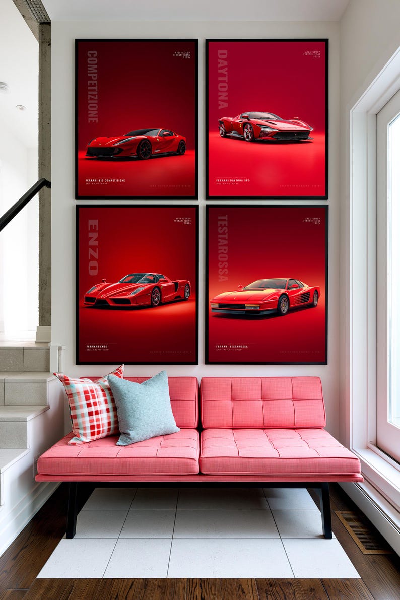 May include: Four framed posters featuring red Ferrari sports cars displayed on a wall above a pink tufted bench. The posters are labeled Competizione, Daytona, Enzo, and Testarossa. The bench has two throw pillows, one red plaid and one light blue.
