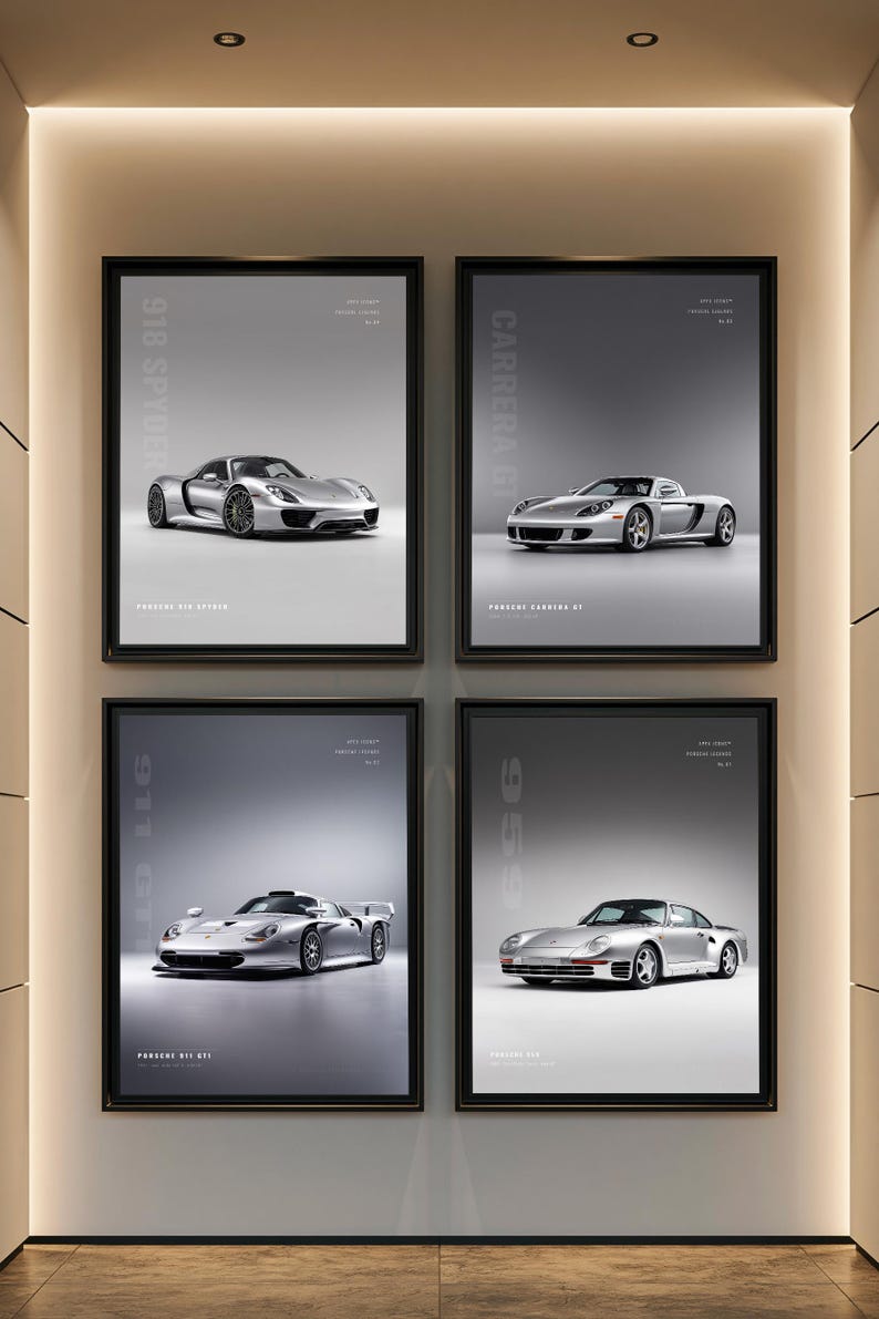 May include: A set of four framed wall art prints featuring silver Porsche sports cars. Each print displays a specific model: 918 Spyder, Carrera GT, 911 GT1, and 959. The posters have a gray background with white text identifying the car models.