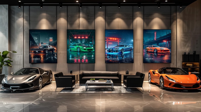 May include: A modern interior space featuring a dark gray sports car on the left and an orange sports car on the right. Four large rectangular wall art prints depict various sports cars in urban settings with red neon accents and Japanese text.