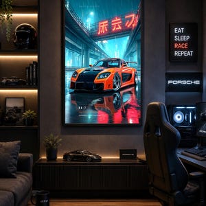 May include: A framed wall poster featuring a bright orange sports car parked on a wet city street at night under a neon sign with Japanese characters. The artwork displays the text RX-7 and Japanese Street Culture in a dark, moody urban setting.