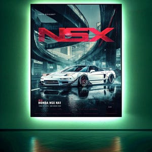 May include: A rectangular wall poster featuring a white Honda NSX NA1 sports car on a wet city street under an overpass. The text reads TOKYO DIVISION, NSX, and HONDA NSX NA1 C30A V6-VTEC MID-ENGINE RWD. The poster is illuminated by a bright green light.