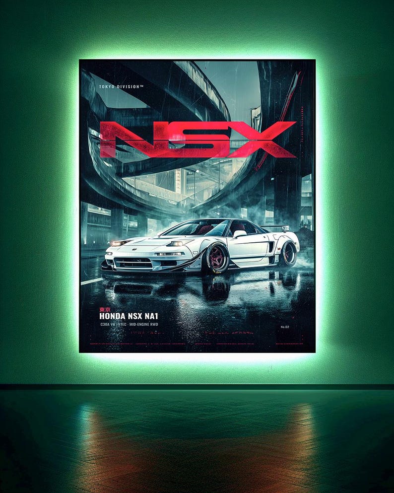 May include: A rectangular wall poster featuring a white Honda NSX NA1 sports car on a wet city street under an overpass. The text reads TOKYO DIVISION, NSX, and HONDA NSX NA1 C30A V6-VTEC MID-ENGINE RWD. The poster is illuminated by a bright green light.