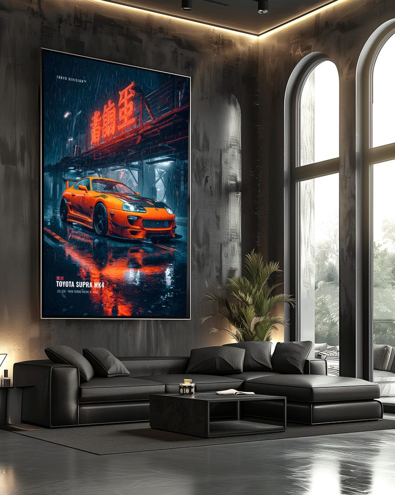 May include: A vertical wall art print featuring a bright orange Toyota Supra MK4 sports car parked on a wet, reflective city street at night. The scene includes glowing red neon Japanese text above the car and the text TOYOTA SUPRA MK4 below.