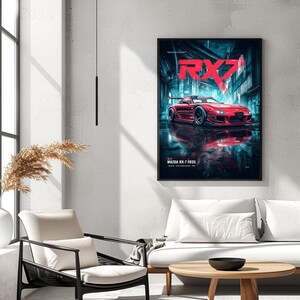 May include: A framed vertical wall art print featuring a red Mazda RX-7 FD3S sports car parked in a dark, neon-lit urban street. The text RX7 is displayed in large red letters at the top, with MAZDA RX-7 FD3S printed in white at the bottom.