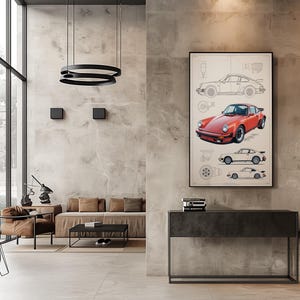 Puede incluir: Un cuadro enmarcado que presenta una ilustraci&oacute;n de un coche deportivo rojo centrado entre dibujos t&eacute;cnicos de l&iacute;neas del mismo veh&iacute;culo en perfiles laterales y superiores, expuesto en una pared de hormig&oacute;n gris claro sobre una consola.
