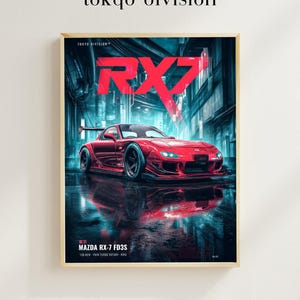 May include: A framed poster featuring a red Mazda RX-7 FD3S sports car parked on a wet city street at night. The text reads "tokyo division", "RX7", and "MAZDA RX-7 FD3S 13B-REW TWIN TURBO ROTARY RWD". The scene is illuminated by bright neon blue lighting.
