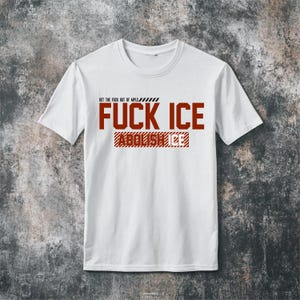 May include: White t-shirt with red text that reads "GET THE FUCK OUT OF MPLS" above "FUCK ICE" and "ABOLISH ICE" in a rectangular box. The shirt has short sleeves and a crew neck.