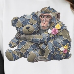 May include: A whimsical illustration of a monkey hugging a teddy bear. Both the monkey and the bear are adorned with denim patchwork, and the monkey is decorated with fabric roses in shades of pink, yellow, and white. The image is set against a white background.