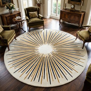 May include: A large, round rug with a cream-colored background and a sunburst design. The sunburst pattern features black and gold lines radiating from a central white circle. The rug is placed on a dark wood floor, surrounded by antique furniture.